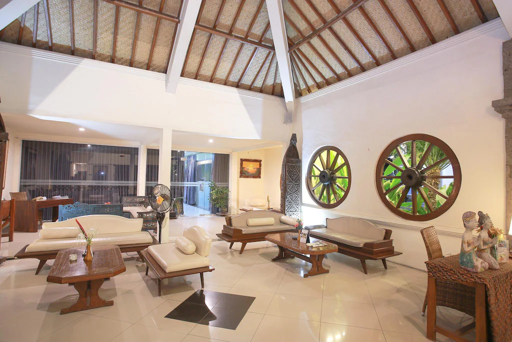 Open Balinese lobby with carved details at Mirah Resort